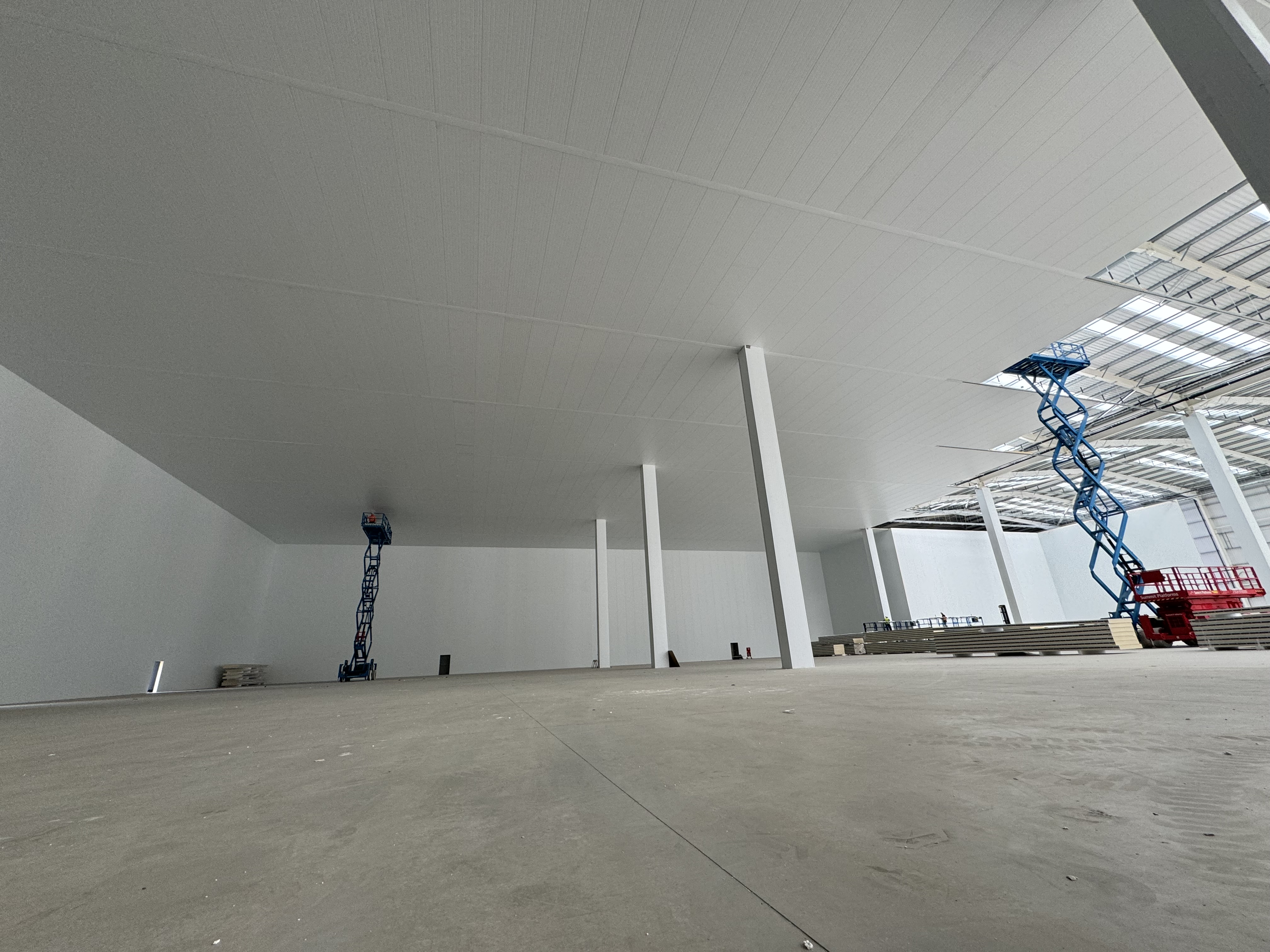 Large-scale insulated panel refurbishment in progress